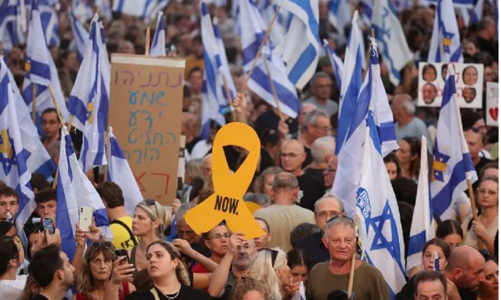 Israeli protesters call for a cease-fire