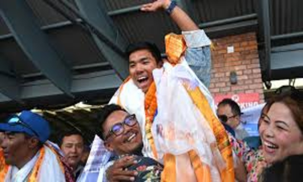 Nepali teenager hailed as hero after climbing world's 8,000m peaks