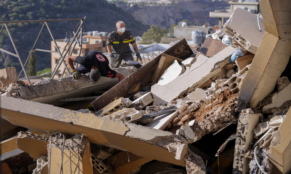 Rescue workers pull 30 bodies from apartments in Lebanon after Israeli strike