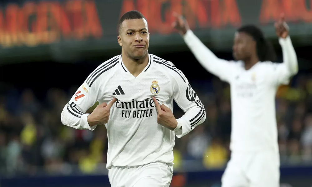 Mbappé scores twice to reach 31 goals for Madrid